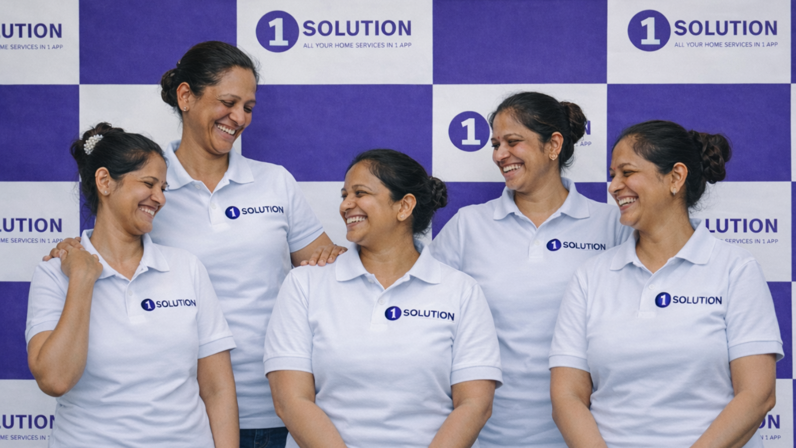 Worker smiling with folded hands